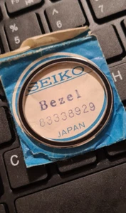 ORIGINAL SEIKO NOS LÜNETTE 83338929 FÜR 6139-8000 6139-8001 6139-8002 - Bild 1 von 1
