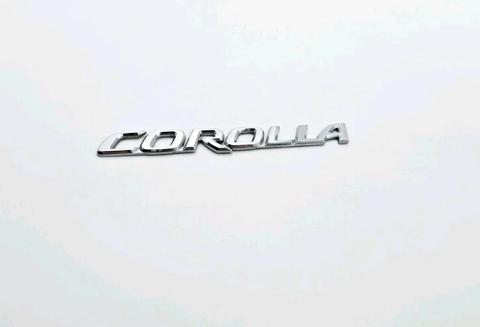 2003-2008 TOYOTA COROLLA REAR TRUNK LID EMBLEM LOGO BADGE SYMBOL OEM - Image 1 of 3