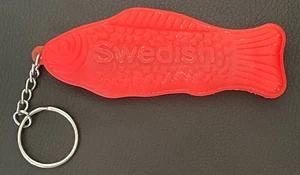 Portachiavi svedese a forma di pesce e porta balsamo labbra - Foto 1 di 5