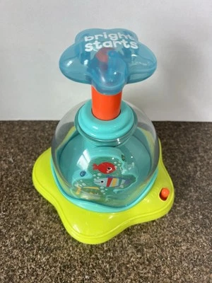 Bright Star Press & Glow Tropical Pez Spinner Juguete para Bebé con Luces y Sonidos Foto 1 de 3