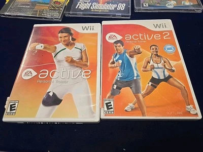Lote de 2 Videojuegos Wii Entrenamiento Fitness EA Entrenador Personal Activo 1 y 2  Foto 1 de 4