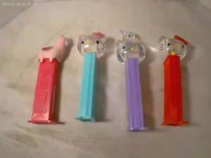 Lot of 4 Hello Kitty Clear Head Pez Dispensers - Picture 1 of 1
