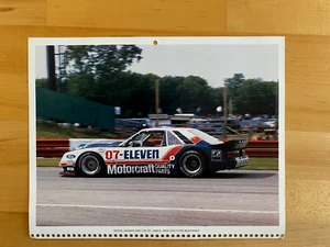 1986 Ford Calendar photo Ford Mustang IMSA Bruce Jenner Lynn St James 10"x7-1/2" - Picture 1 of 1