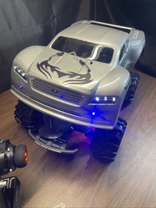 Auto Hupe 🎵 Radio JLB Racing Cheetah 6s Spektrum Regler Brushless 1/8 Rtr Rc Auto - Bild 1 von 24