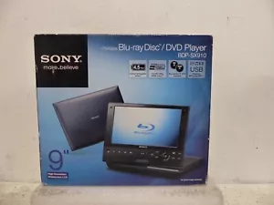 RARO NUEVO! Reproductor de DVD portátil Sony BDP-SX910 con pantalla (9") ~ ENVÍO GRATUITO - Imagen 1 de 7