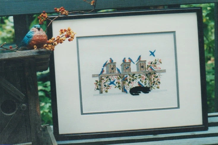 Blue Birds Play While Kitty Sleeps by Diane Graebner cross stitch pattern - Image 1 of 1