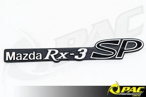 Insignia del cuarto trasero Mazda Rx-3 SP Savanna - par - Imagen 1 de 1
