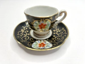 Vintage besetztes Japan China Miniatur Teetasse und Untertasse schwarz & gold - Bild 1 von 6
