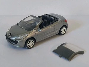 Norev 3 inches 1/64. Peugeot 207 cc Roland Garros Gris. Neuf en boite - Imagen 1 de 11