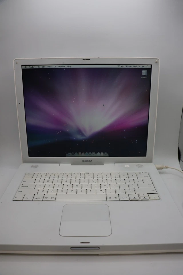 Macintosh iBook G4 1.07 GHz 14.1" LCD screen Mac OS 10.5.8 Model A1055- 1 .25 GB - Image 1 of 4