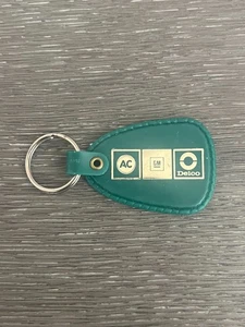 Vintage AC GM Delco General Motors Green Plastic Keychain - Picture 1 of 2