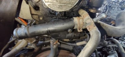 Carcasa termostato Volkswagen Golf 1999 (brida) usada, genuina #1139009-33 Foto 1 de 4