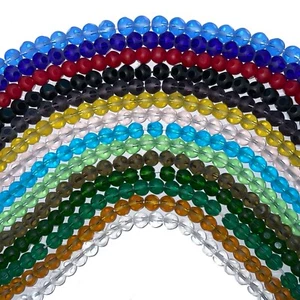 a String of AAA Quality Faceted and selectively frosted glass beads, round - Picture 1 of 14