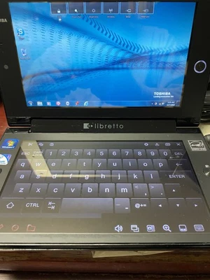 Toshiba Libretto W105. Works Great! Nice! Rare. Mint Condition. Duo LCD Screen. - Image 1 of 4