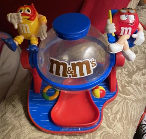 M&Ms Collectible Make a Splash candy dispenser flip forward to dispense - Picture 1 of 5