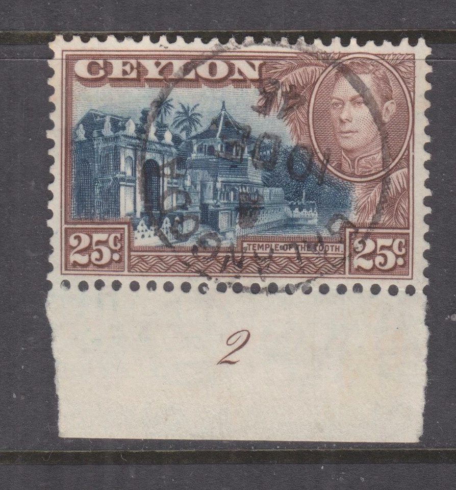 Marca de agua vertical CEYLON, 1944 KGVI, 25c. Azul y chocolate, plato #2, usado. Foto 1 de 1