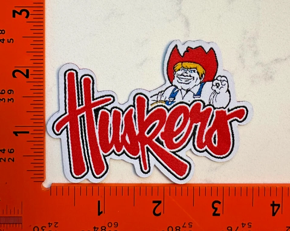 Parche de jersey de hierro/coser de cáscaras de maíz de la Universidad de Nebraska Foto 1 de 1