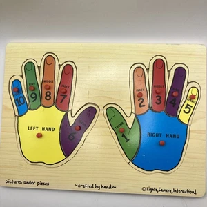 Melissa & Doug Hand Peg Wooden Puzzles - Picture 1 of 10