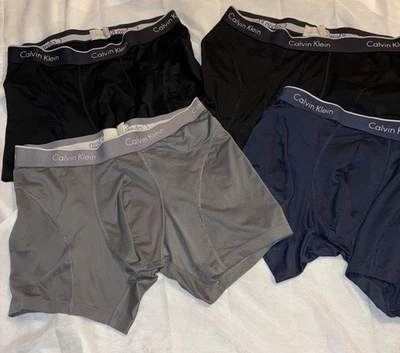 Calzoncillos boxer Calvin Klein de algodón elástico para hombre 4 pares negros azul marino gris talla M Foto 1 de 4