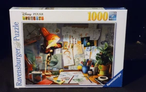 Rompecabezas Ravensburger Disney Pixar El Artista Escritorio 1000 Piezas Nuevo Precintado - Imagen 1 de 1