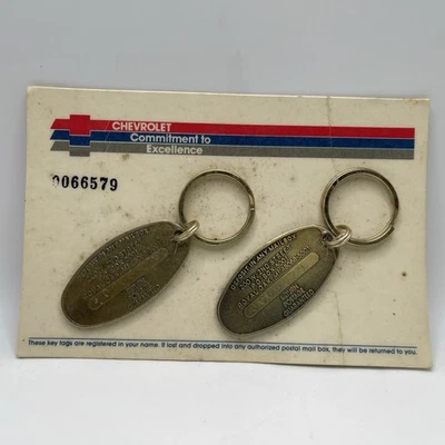 CHEVROLET Commitment to Excellence Brass Return Postage Key Chain - Image 1 of 4
