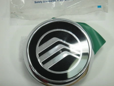 86 87 Mercury Lynx 1985 parrilla adorno emblema medallón nuevo de stock Foto 1 de 4