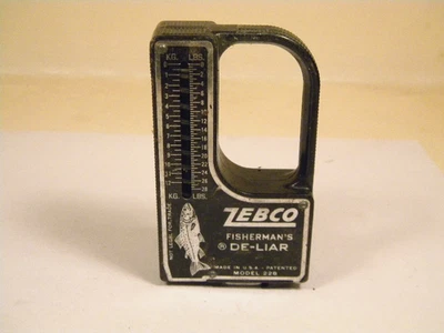 Vintage Zebco De-Liar Modelo 228 Escala y Cinta Medida Trucha Foto 1 de 3