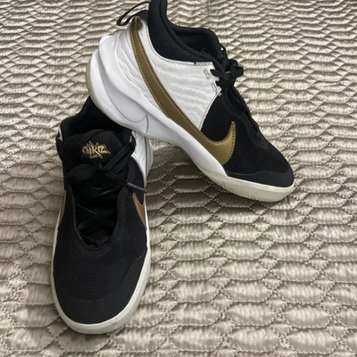 Nike Youth Size 4 Hustle Basketball Shoes. Black/gold.  Great Condition - Image 1 of 4
