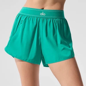 Pantalón corto Alo Yoga Match Point verde abeto XXS - Imagen 1 de 11