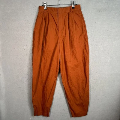 Pantalones cónicos Uniqlo x Comptoir Des Cotonniers talla pequeña naranja óxido cintura alta Foto 1 de 4