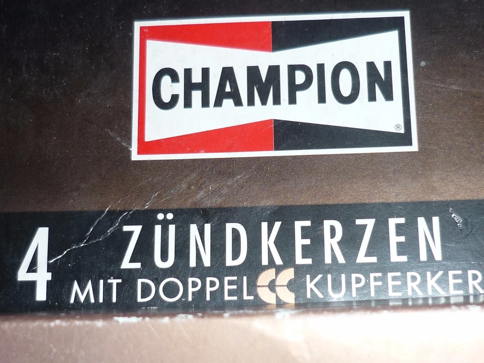 1 set = 4 pieces original Champion RF7YCC spark plugs set of spark plugs new original packaging - Image 1 of 1