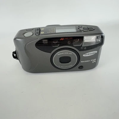 Cámara fotográfica Samsung Máxima Zoom Alpha 35 mm Point Shoot 38-70 mm lente flash AF Foto 1 de 4
