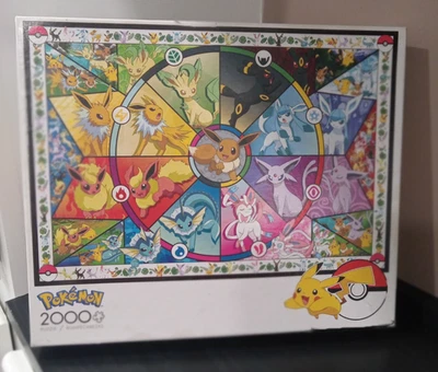 NEW Pokemon Jigsaw Puzzle Buffalo Games Eevee's Evolutions - 2000 Pieces - Image 1 of 4