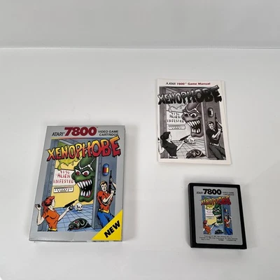 Vintage 1980's Atari 7800 Xenophobe Complete Set Game w/ Manual CX7858 - Image 1 of 4