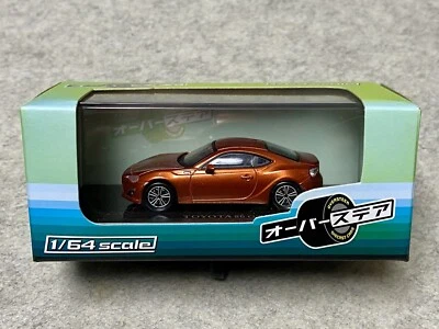 Oversteer Toyota 86 GT Metallic Orange 1/64 Diecast - Image 1 of 4