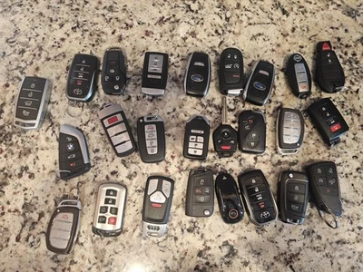 lot of 25 oem factory Car Key Fobs, Hyundai, Tesla, Toyota, Audi, Subaru, BMW - Image 1 of 2