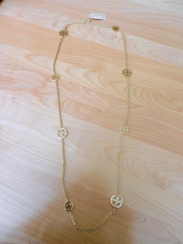 Collana Michael Kors disco aperto tono oro prezzo al pubblico consigliato $ 195