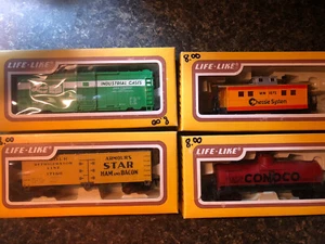 Lotto Life Like treno box auto, petroliera, caboose, frig scala HO orig. Scatola - Foto 1 di 3