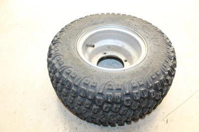 Llanta trasera Arctic Cat 50 2006 utilitaria con neumático Kenda 16X8-7  Foto 1 de 4