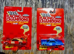🔥RACING CHAMPIONS🔥2 NASCAR #11 BLU '64 FORD & #22 ROSSO/ORO '69 DODGE DAYTONA - Foto 1 di 3