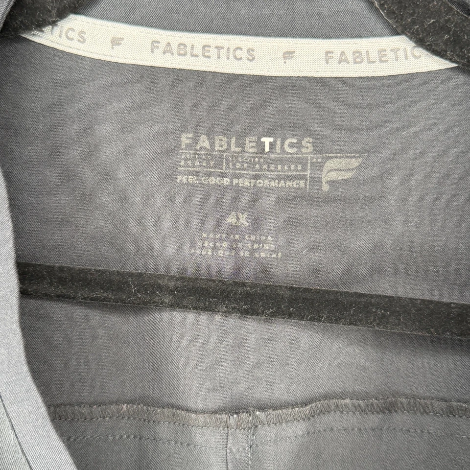 Lote de 2 tops exfoliantes para mujer 4X Fabletics negro + ciruela Anatomía gris Foto 1 de 4