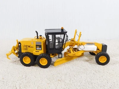 Niveladora KOMATSU GD655 "Servicio Forestal de los Estados Unidos" PRIMERA MARCHA 50-3149 con desgarrador 1/50 Foto 1 de 4