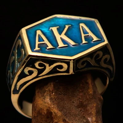 PSEUDONYM AKA RING, MENS BIKER RING, AKA - AS KNOWN AS, HEXAGONAL BLUE SIZE 13 - Image 1 of 4
