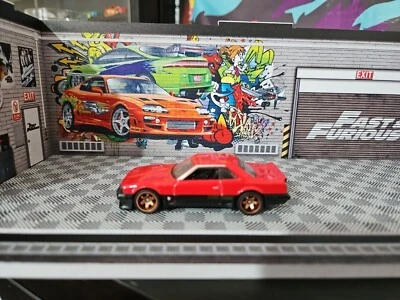 Intercambio de ruedas personalizado Hot Wheels Nissan Skyline GT-R en ruedas Real Riders poste combinado Foto 1 de 4
