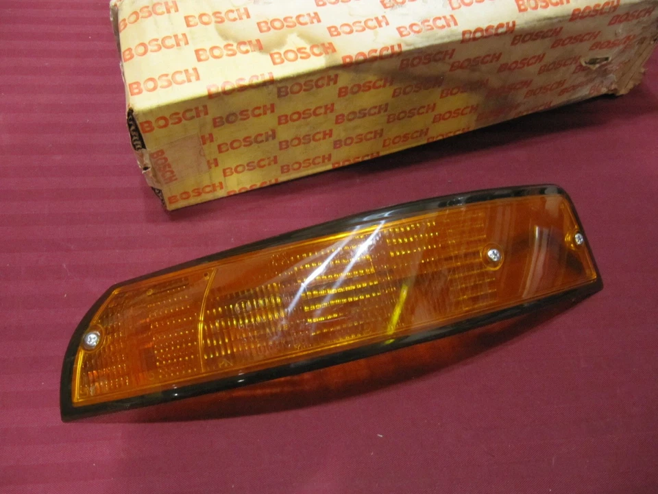 Lente señal de giro izquierda Porsche 911 1973 NOS Bosch Alemania 911 631 947 00 Foto 1 de 4