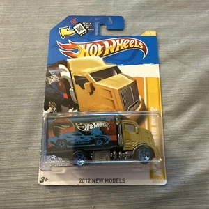 2012 Hot Wheels #45 New Models 45/50 HIWAY HAULER 2 Gold/Black w/Blue 5 Spokes - Picture 1 of 2