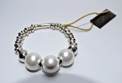 Pulsera elástica superlativa Uno de 50 Foto 1 de 4