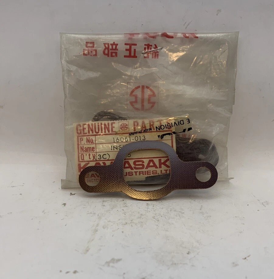 NOS OEM KAWASAKI HEAT INSULATOR PART NUMBER 16061-013 1973-1975 S1 KH250 - Image 1 of 1
