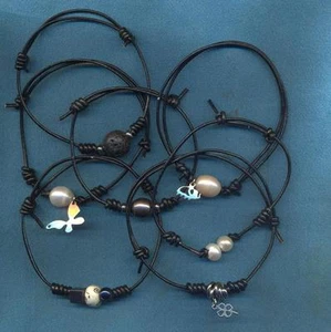 Bracciale annodato in cuoio con acciaio e perle (1 a scelta) - Imagen 1 de 11