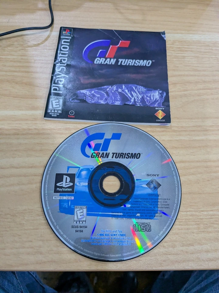 O1 GT Gran Turismo (PlayStation 1, PS1) Polished Disc & Manual Only NO CASE - Image 1 of 1